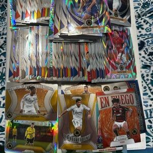 Panini Card Game Set with Gold, Silver, and Red Accents